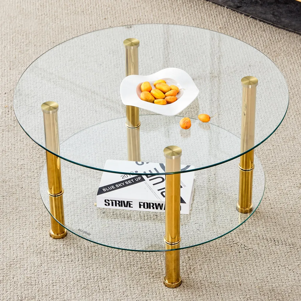 Table basse en verre et métal doré pour salon au style moderne