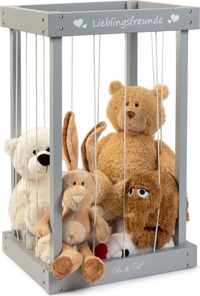 A wooden box with strings holding stuffed animals inside.