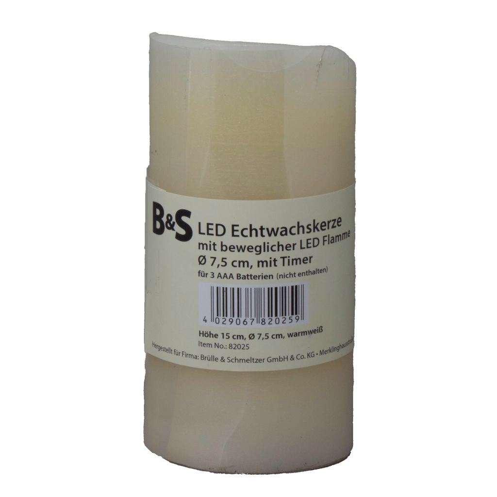 A cream-colored LED candle with a label wrapped around it.