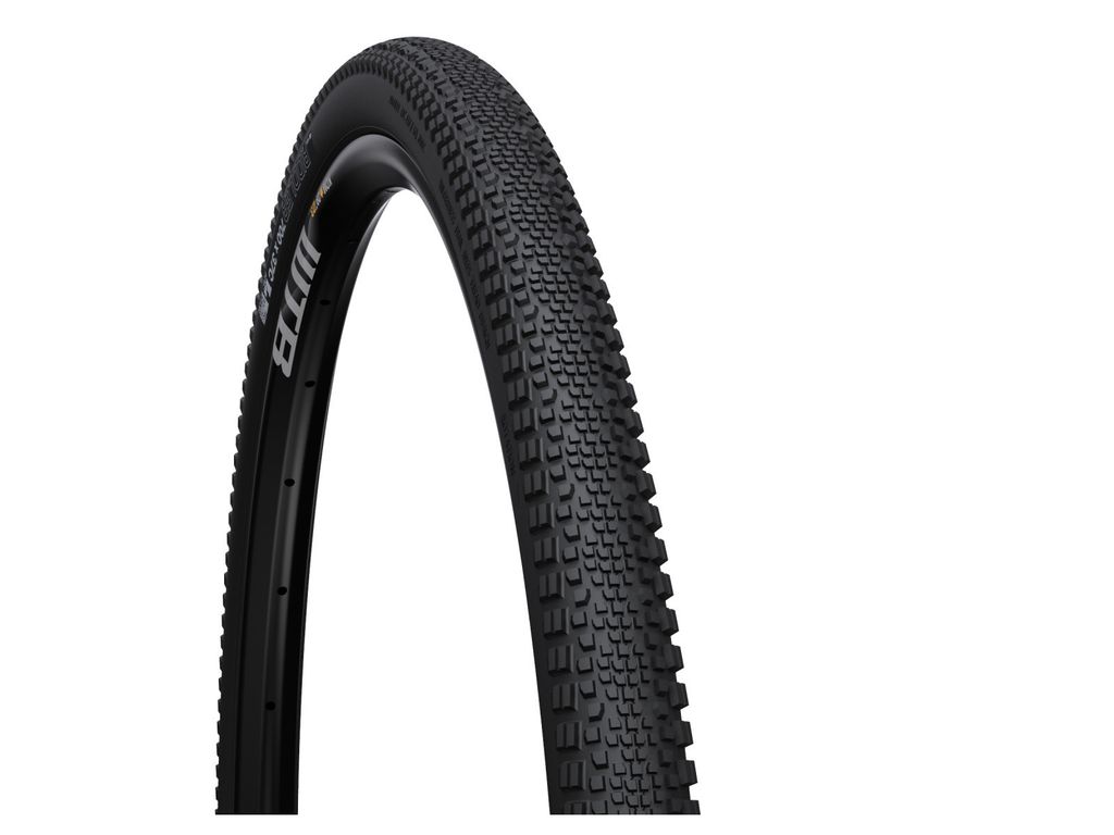 A black bicycle tire is shown against a white background.
