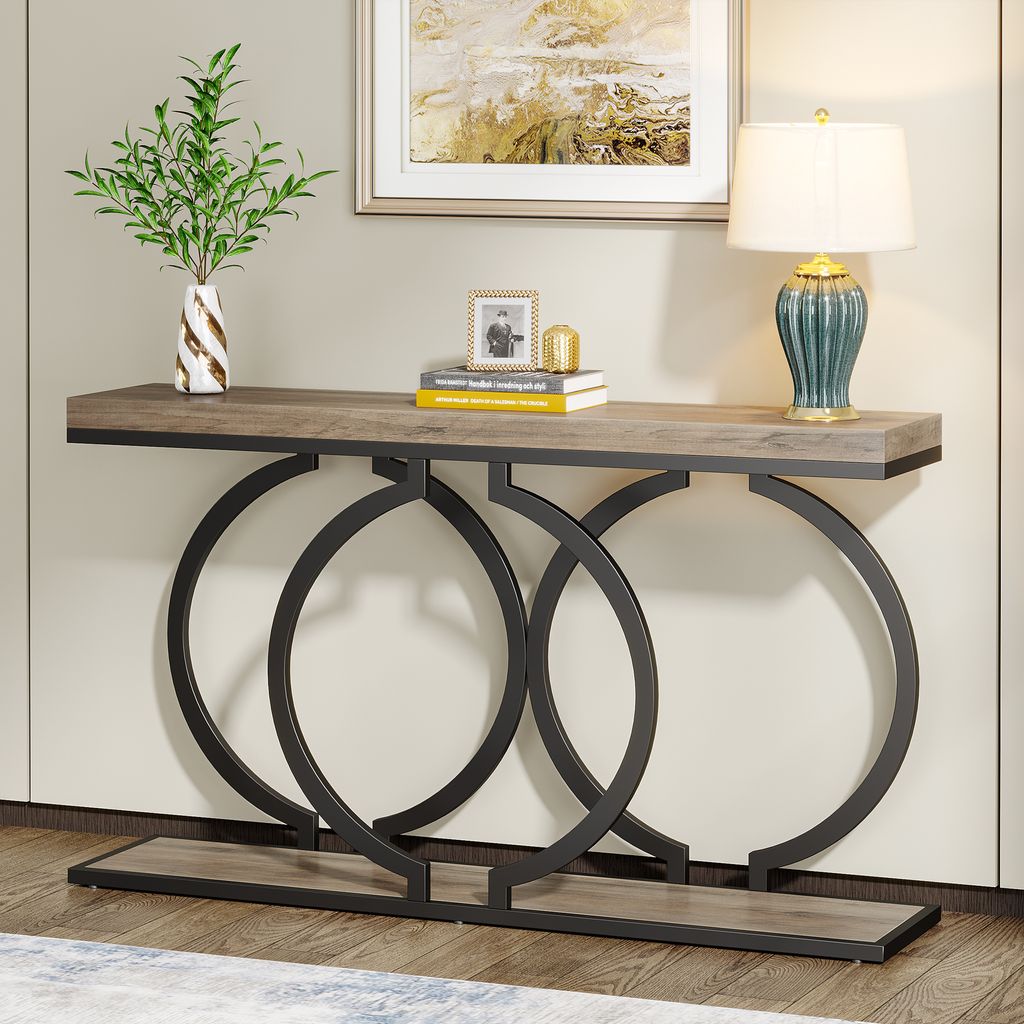 A console table with decorative elements and a lamp.