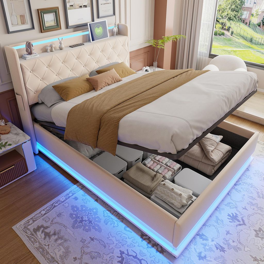 A bedroom scene with a bed that has storage underneath and LED lighting.