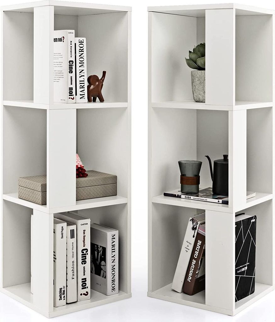 Two white cube-shaped bookshelves are displayed side-by-side, filled with various decorative items and books.