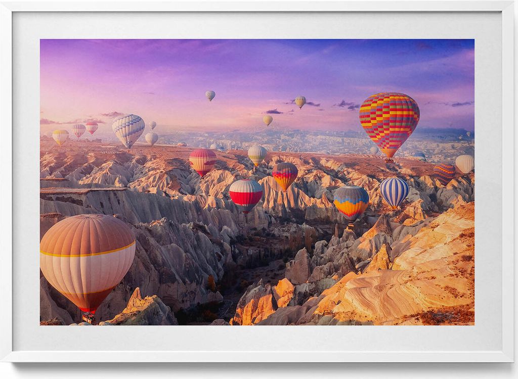 Ballons fliegen über eine Schlucht– Wandbild mit Rahmen – Gerahmtes Bild – Wanddekoration – 100x70 cm – Weiß Rahmen
