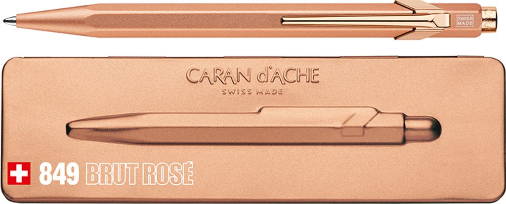 A rose gold pen and its packaging.