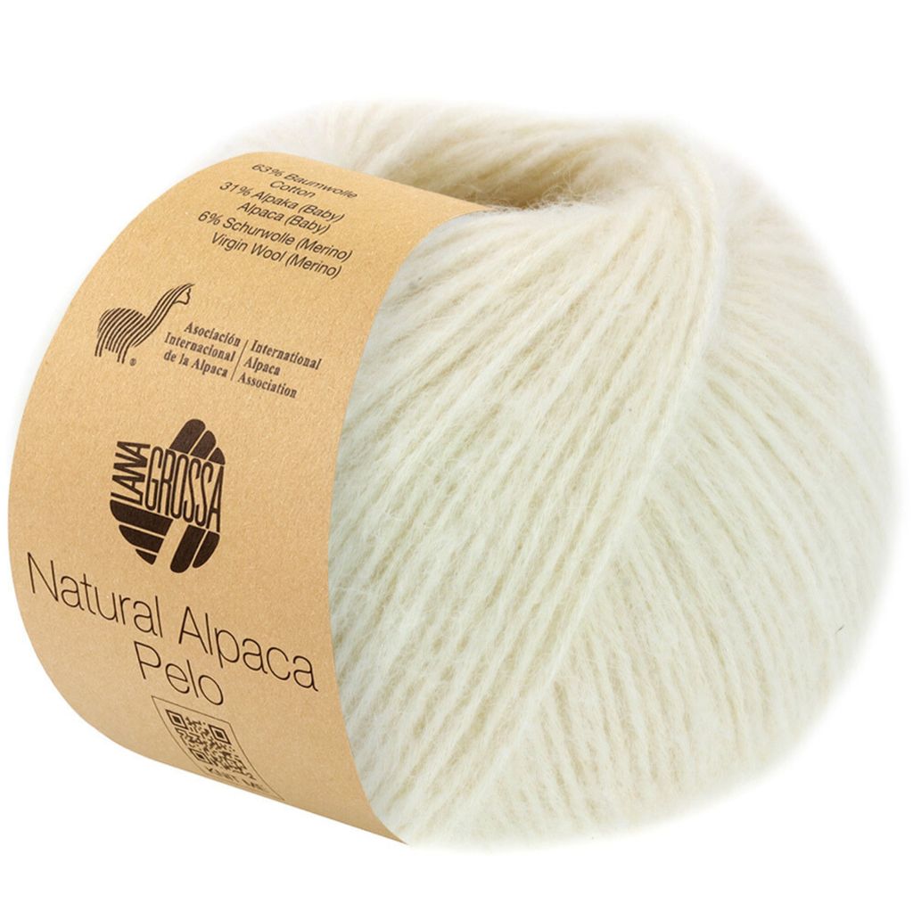 A ball of cream-colored yarn with a brown paper label wrapped around it.