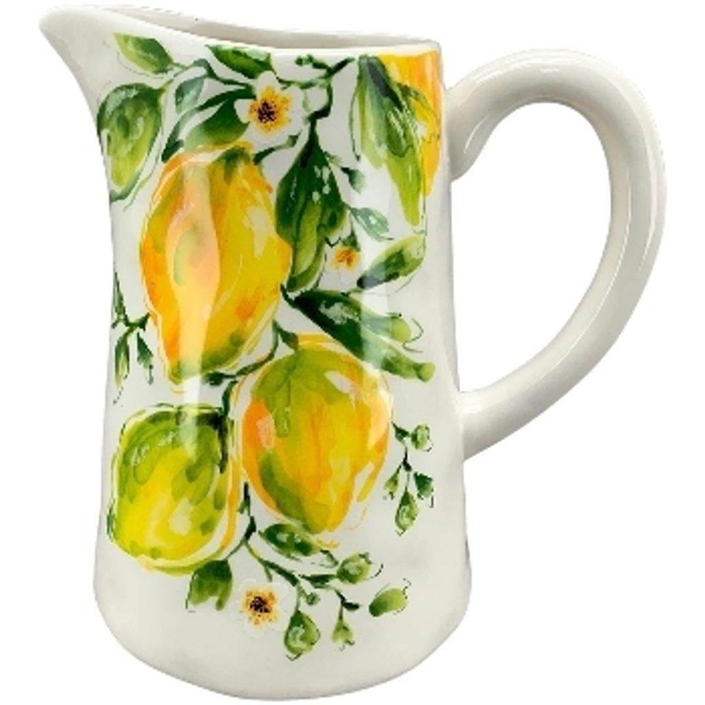 A white ceramic pitcher decorated with a lemon and leaf pattern.