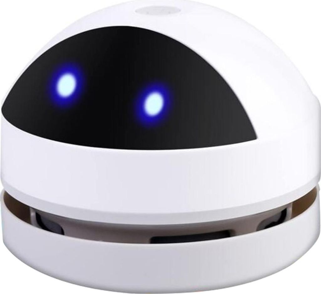 A white mini desktop vacuum cleaner with blue glowing eyes.