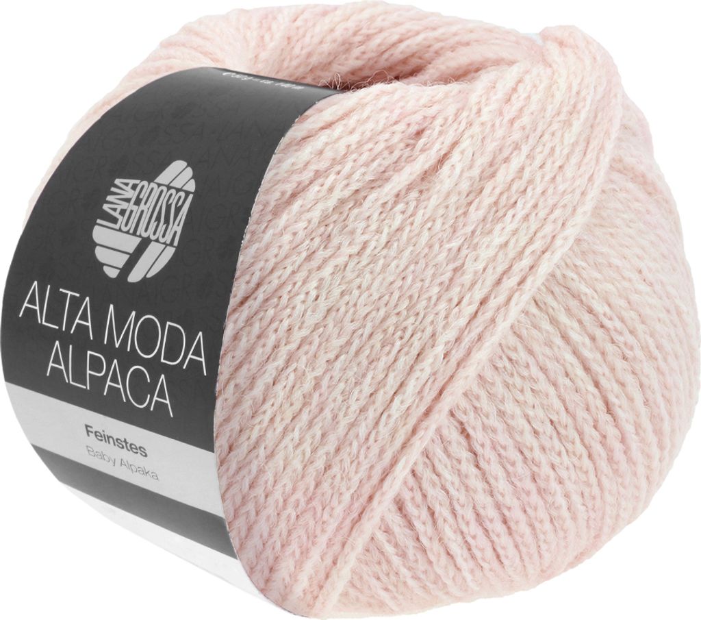 A ball of pink yarn with a black label.