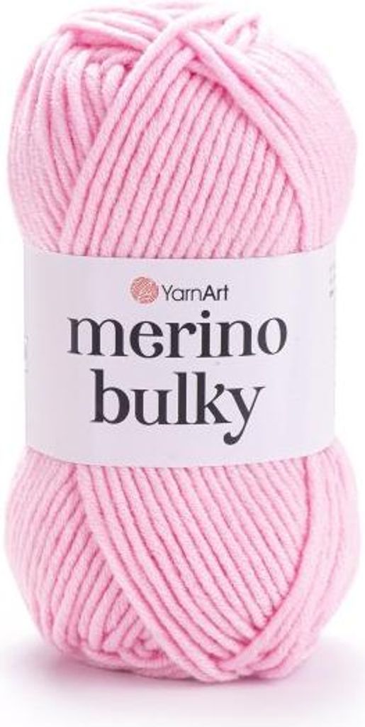 A ball of pink yarn with a label.