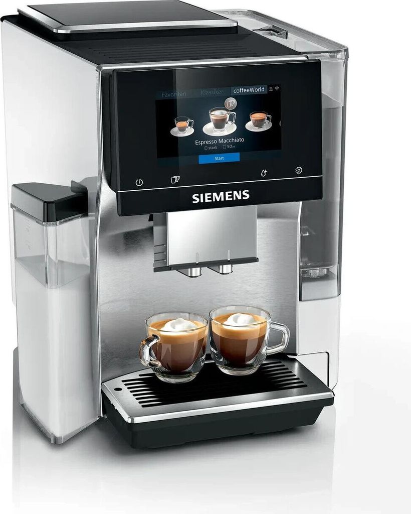 A Siemens coffee machine with two cups of coffee on the drip tray.