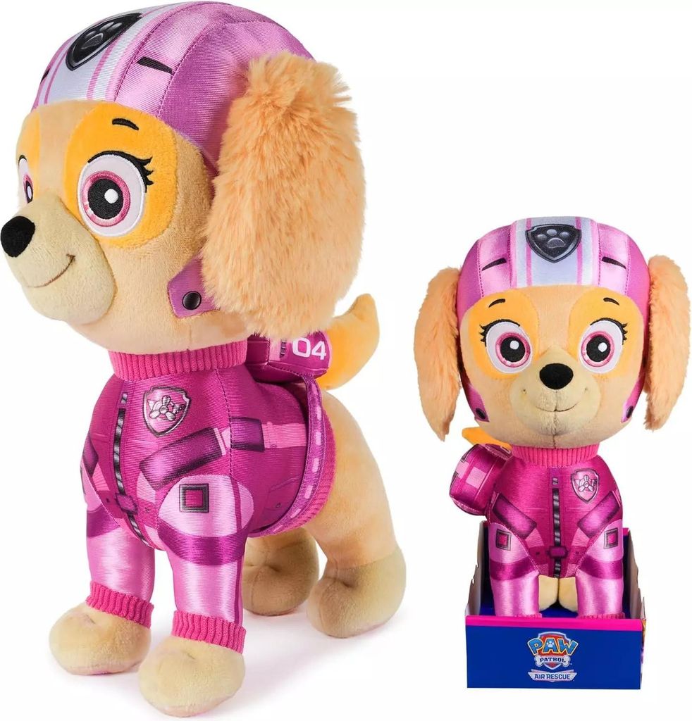 Two plush toys of the character Skye from Paw Patrol, one larger and one smaller in its packaging.