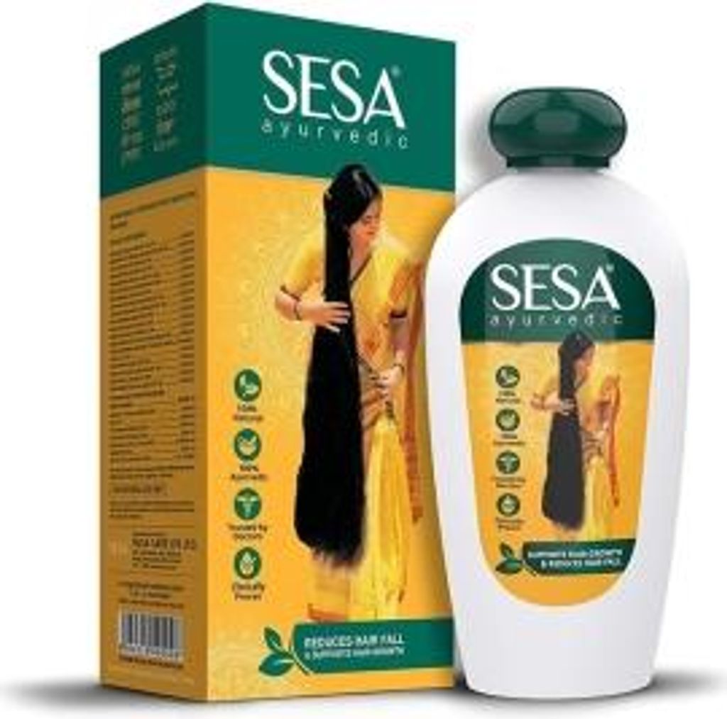 A product shot of SESA Ayurvedic hair oil, featuring both the bottle and its packaging box.