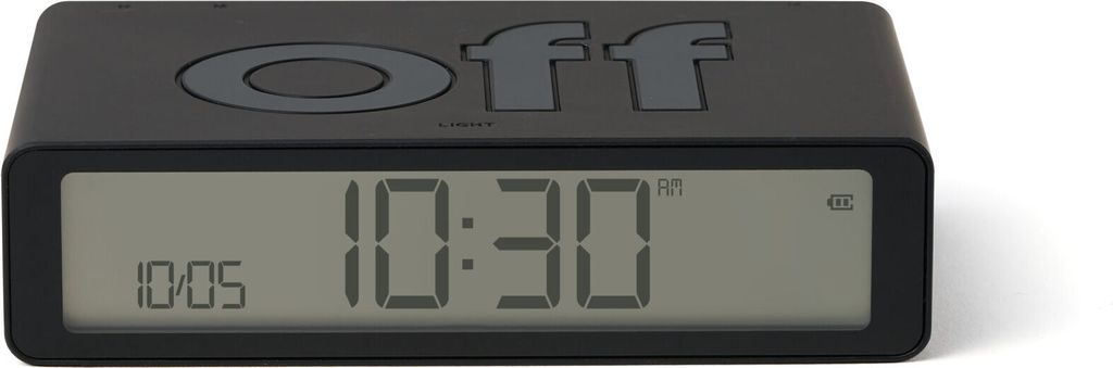 A black digital alarm clock with a digital display showing the time.