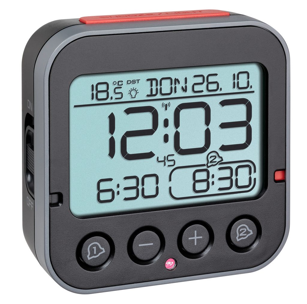 A digital alarm clock with a light blue screen displaying the time, date, and temperature.
