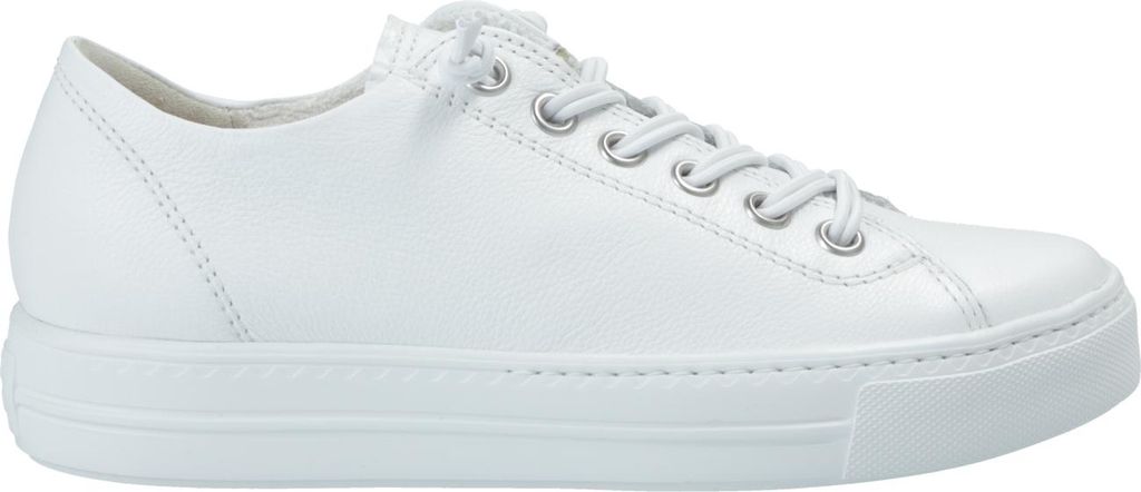 A side view of a white leather sneaker.