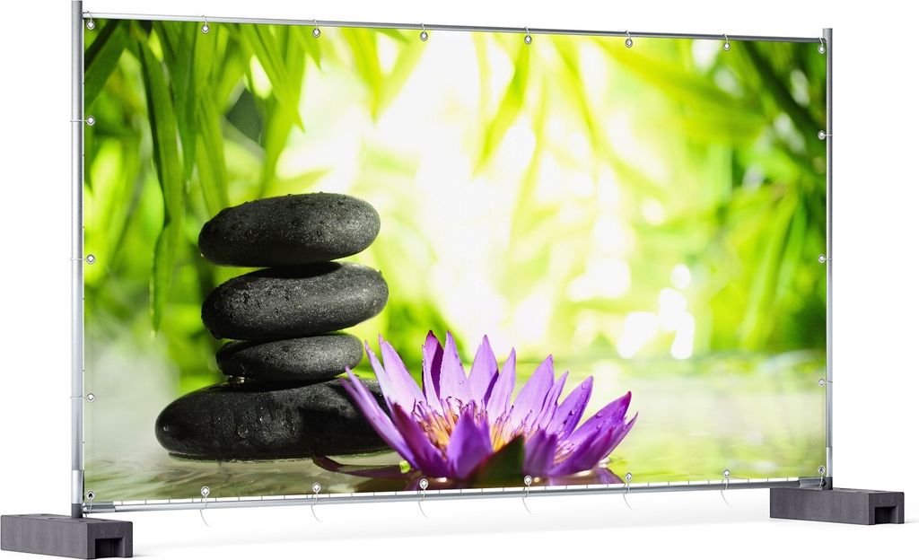 Wallario XXL Outdoor-Poster für Garten oder Balkon, Motiv Steinstapel in schwarz mit Blumenblüte in lila, in ca. 340 x 173 cm