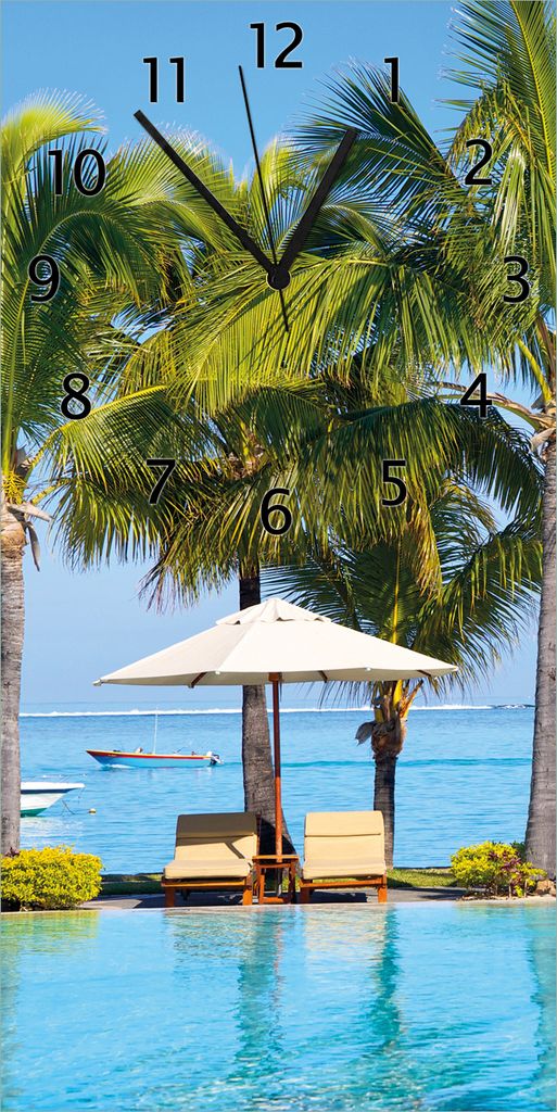 Wallario Design Wanduhr bedruckt, Größe 30 x 60 cm, Motiv: Sonnenschirme am Südsee-Palmenstrand mit blauem Meer-Wasser