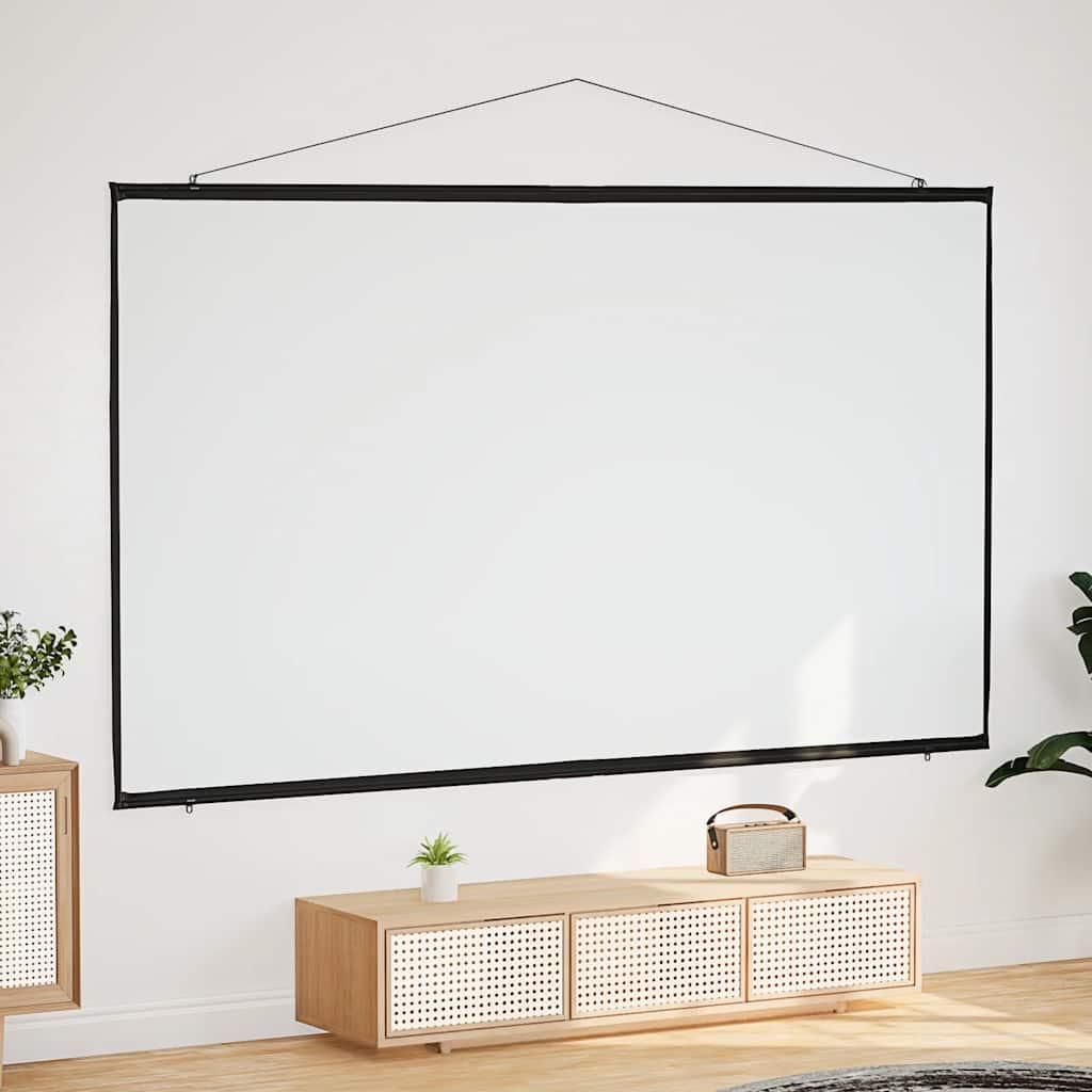 A white projection screen is mounted on a white wall above a wooden media console.