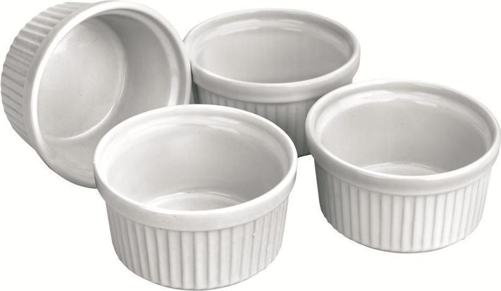Four white ceramic ramekins are arranged on a white background.