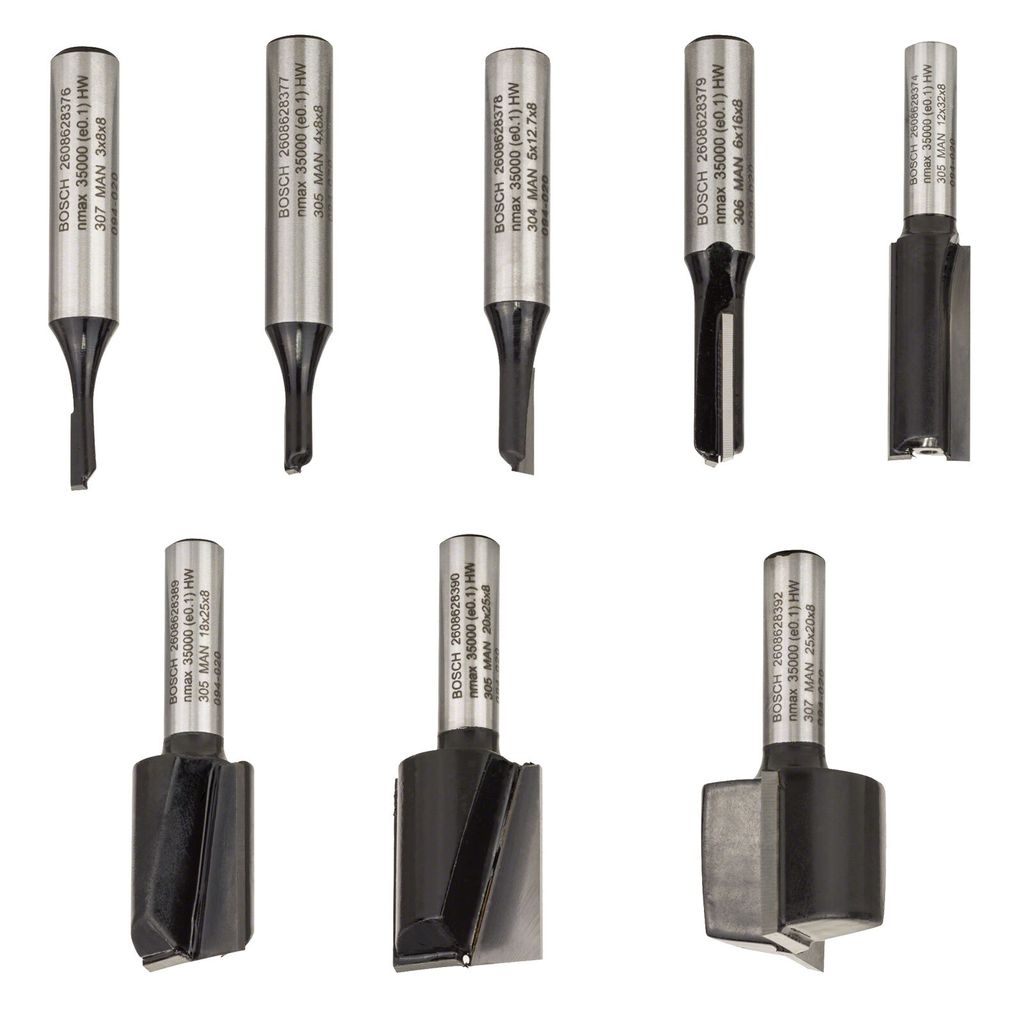 A collection of router bits arranged in two rows against a white background.