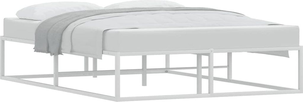 A white metal bed frame with a mattress and a grey blanket.