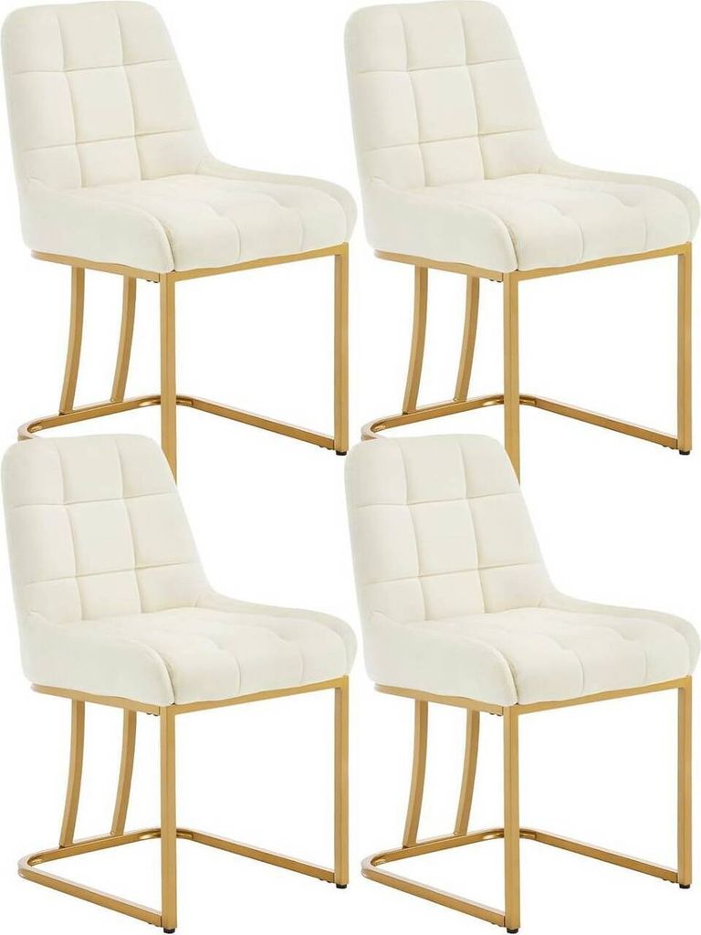 Four beige upholstered dining chairs with gold metal legs are arranged in a two-by-two grid against a white background.