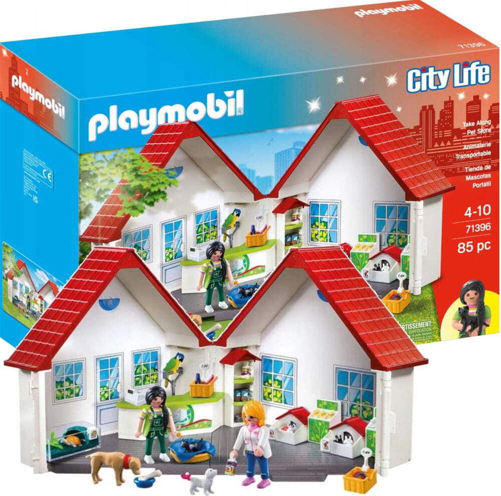 A Playmobil City Life portable pet shop playset is shown, with the packaging in the background.