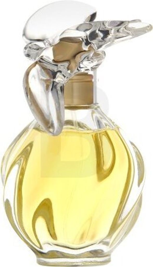 A perfume bottle with yellow liquid inside and a clear, sculpted cap.