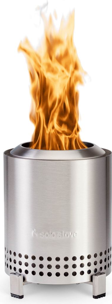 A stainless steel fire pit with flames burning inside, set against a white background.