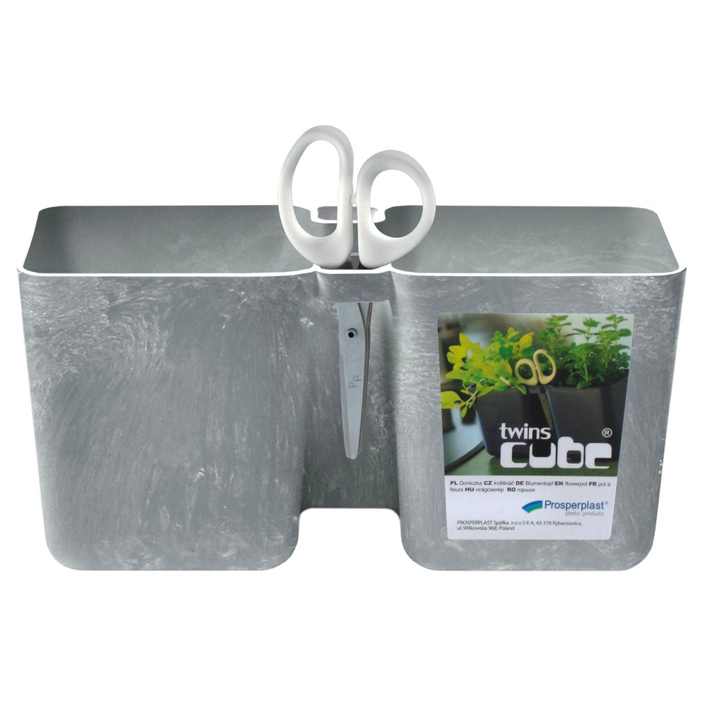 A gray planter with a marbled texture, featuring a pair of white scissors attached to the side. A label with an image of herbs and the product name is on the right side.