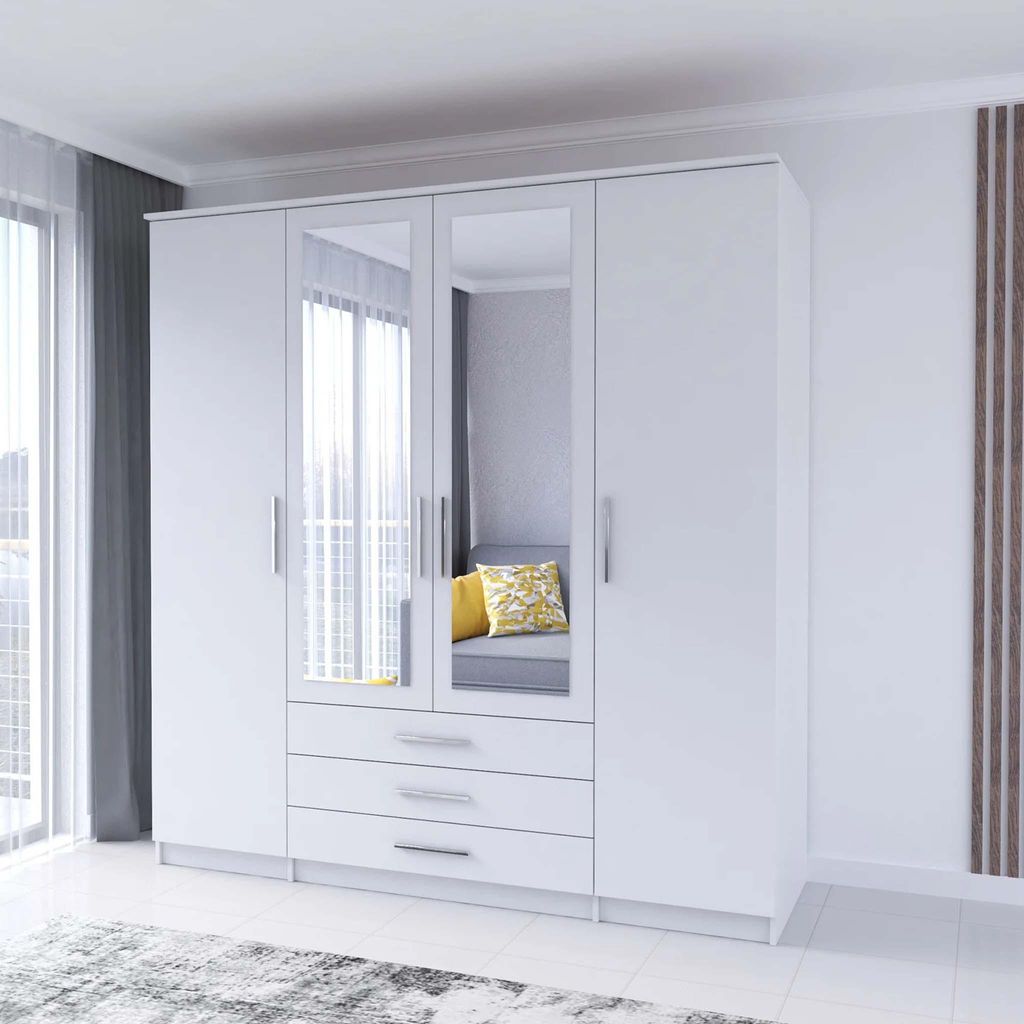 A white wardrobe with mirrored doors, showcasing a clean and modern bedroom setting.