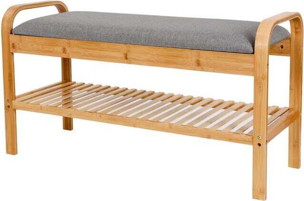 A wooden bench with a gray cushion and two slatted shelves.