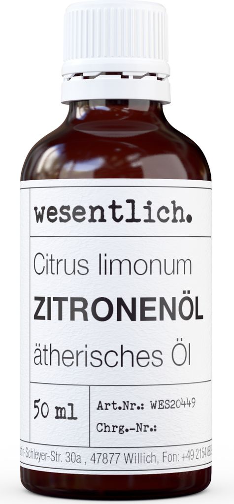 A bottle of essential oil with a label.