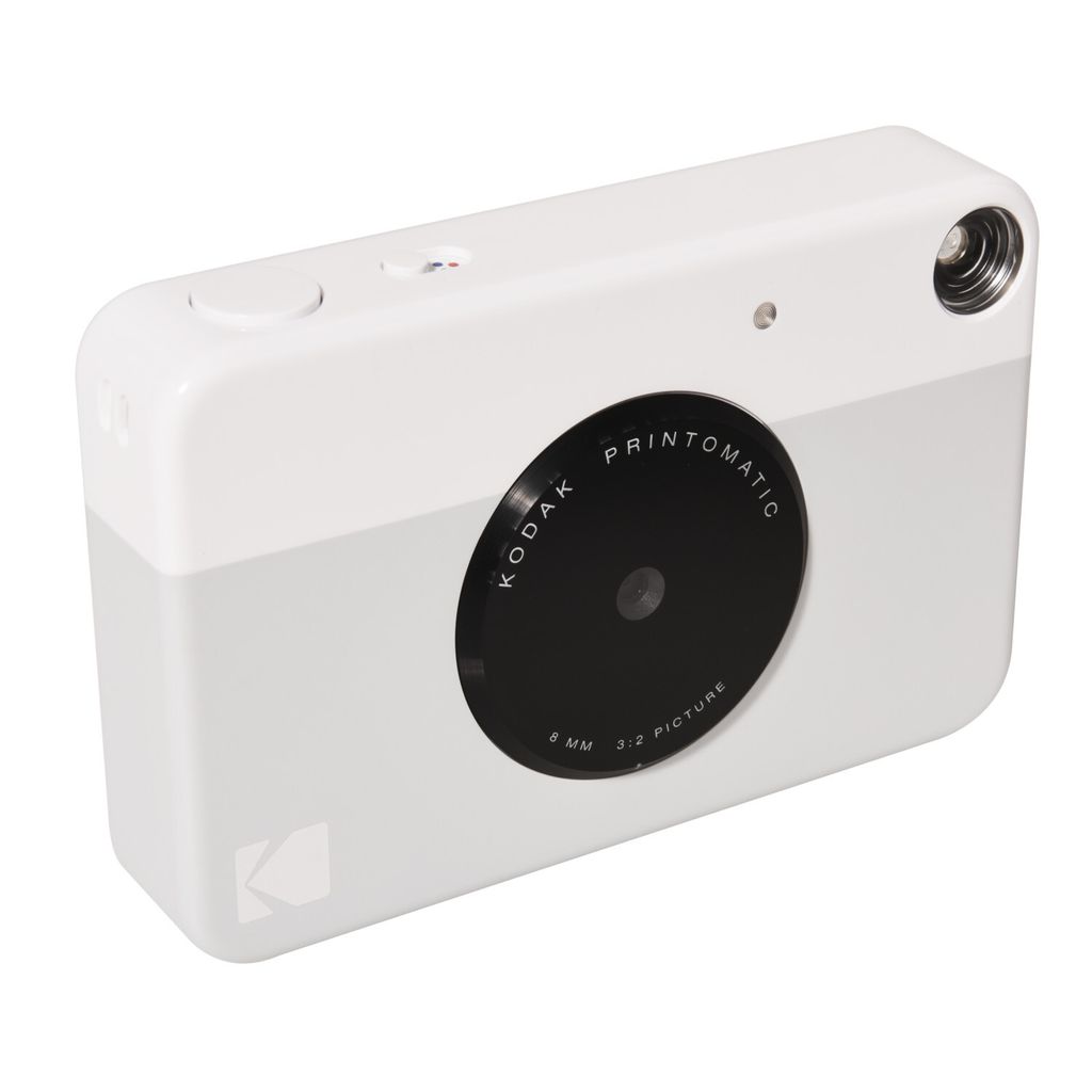 A white and gray Kodak Printomatic instant camera is shown against a white background.