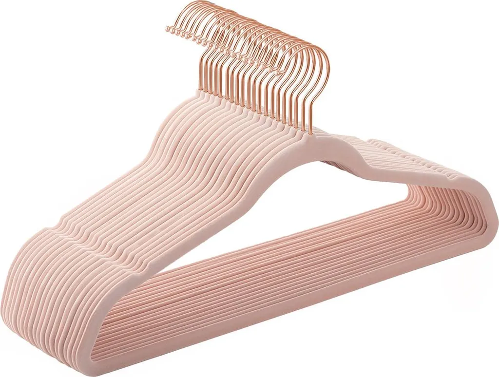 Cintres fins en velours noir et métal or rose pour gain de place massif