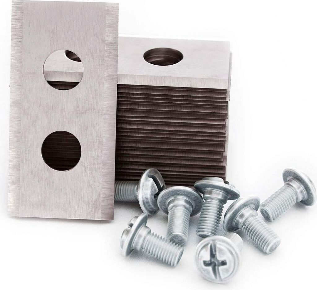 A stack of metal blades and several screws are arranged on a white background.