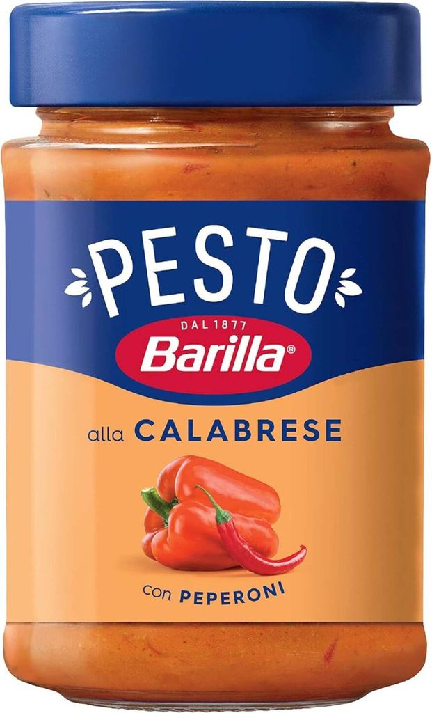 A jar of Barilla Pesto alla Calabrese with peppers and chili peppers.