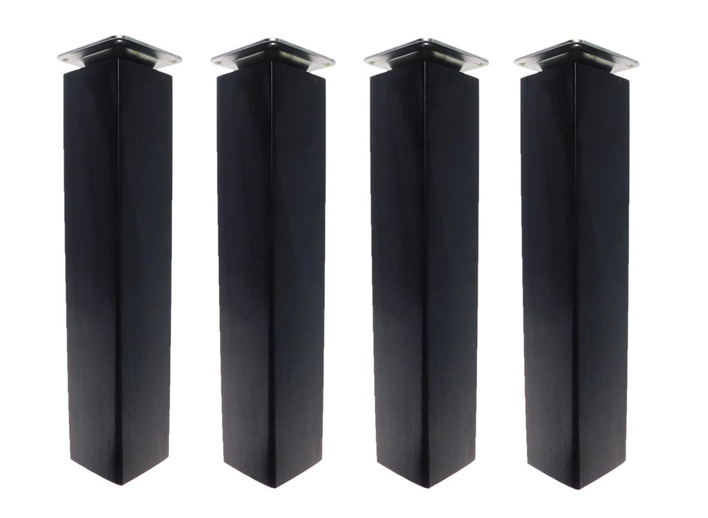 Four black furniture legs are arranged in a row against a white background.