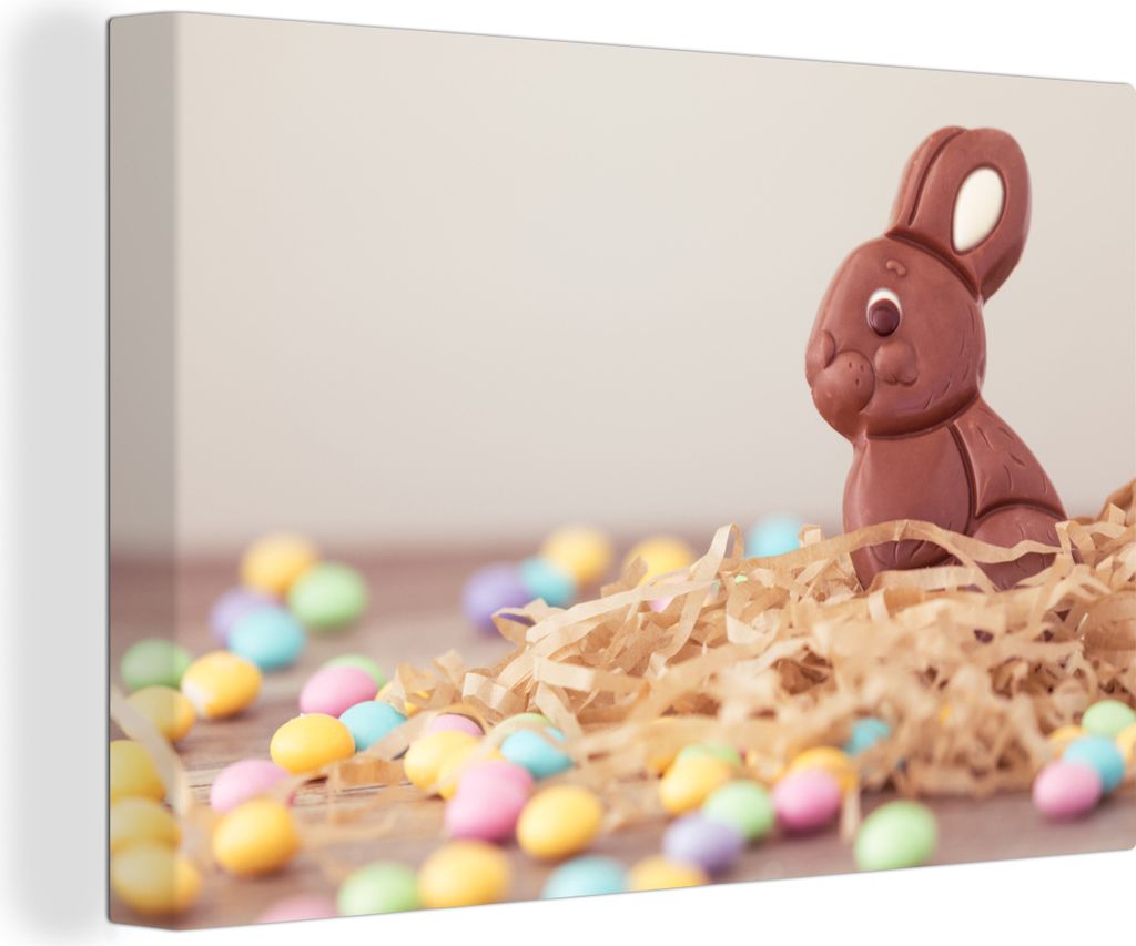 OneMillionCanvasses - Leinwandbilder - 140x90 cm, Ein Schokoladenhase mit kleinen Eiern zu Ostern, Wandbilder Kunstdruck Wanddekoration - Foto au...