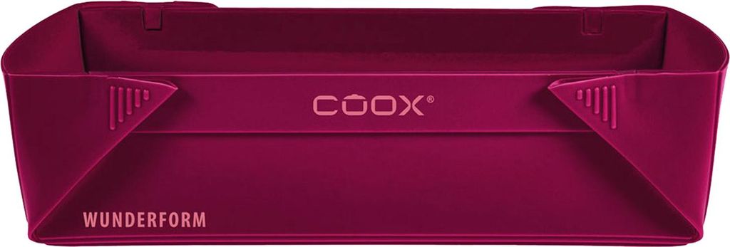 A product shot of a dark red silicone baking mold.