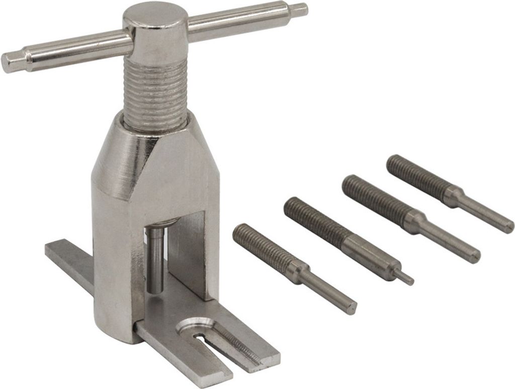 A metal tool set for removing gears from a motor, with four interchangeable tips.