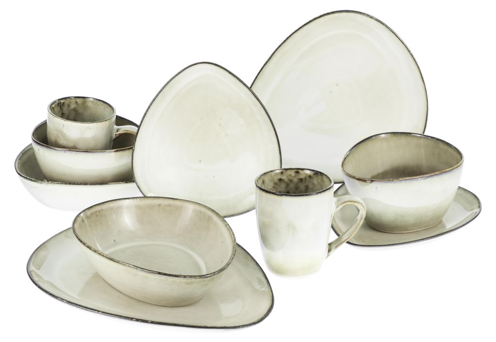 A collection of ceramic tableware, including plates, bowls, and mugs, arranged on a white background.