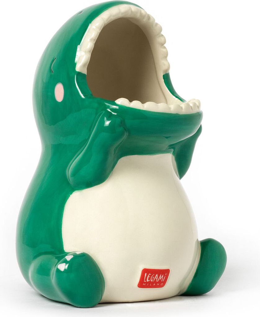 A green ceramic dinosaur figurine with its mouth open, sitting down.