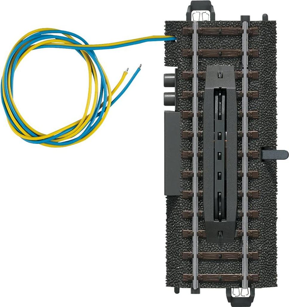 A model railway track piece with wires attached.
