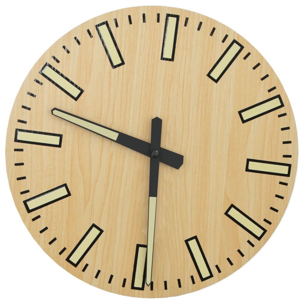 A close-up view of a wooden wall clock with black hands and luminous hour markers.