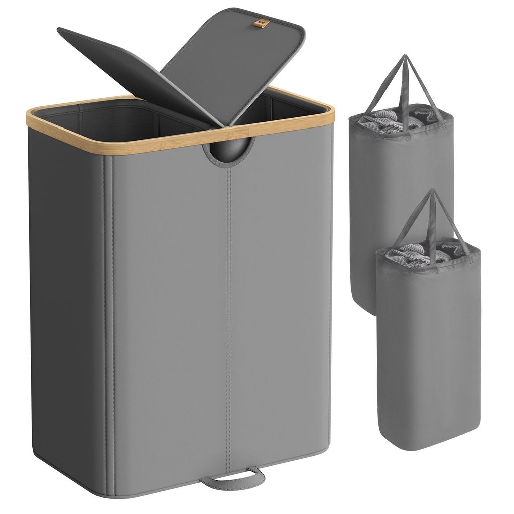 A grey laundry basket with a wooden rim and a divided lid is shown, along with two smaller grey laundry bags.