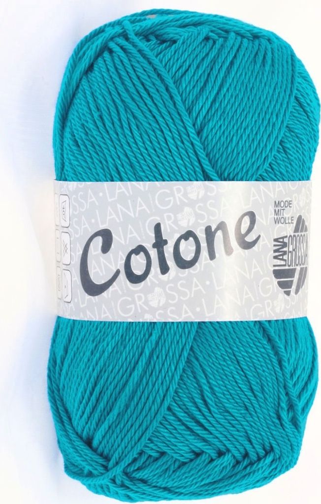 A ball of teal yarn with a label.