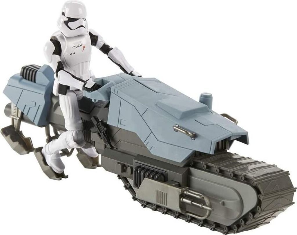 A toy stormtrooper action figure riding a futuristic motorcycle.
