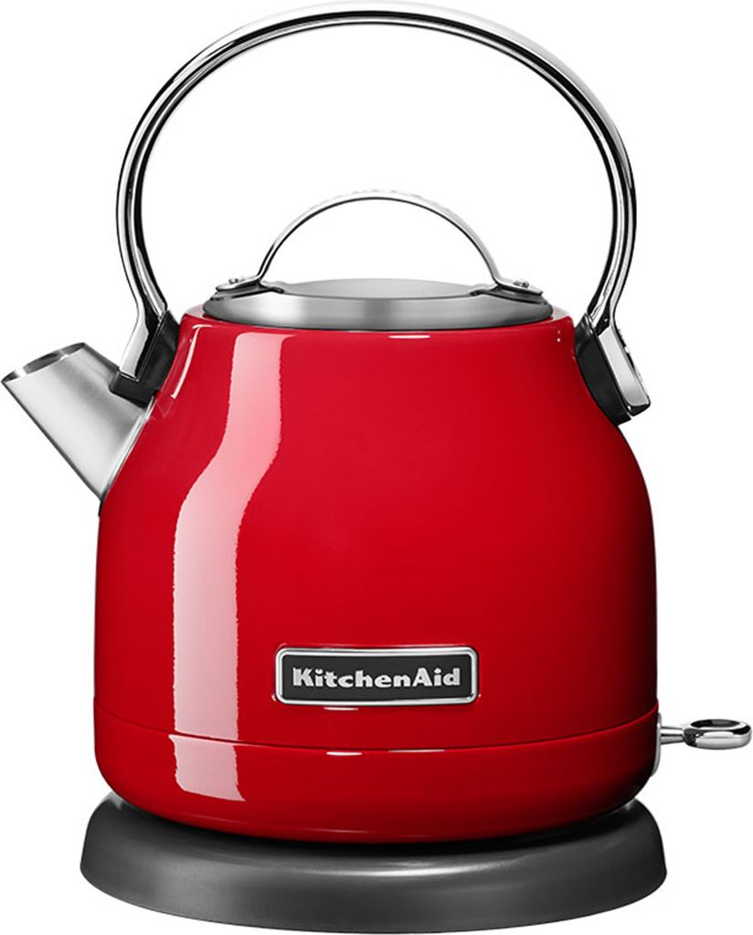 A red KitchenAid electric kettle on a gray base.